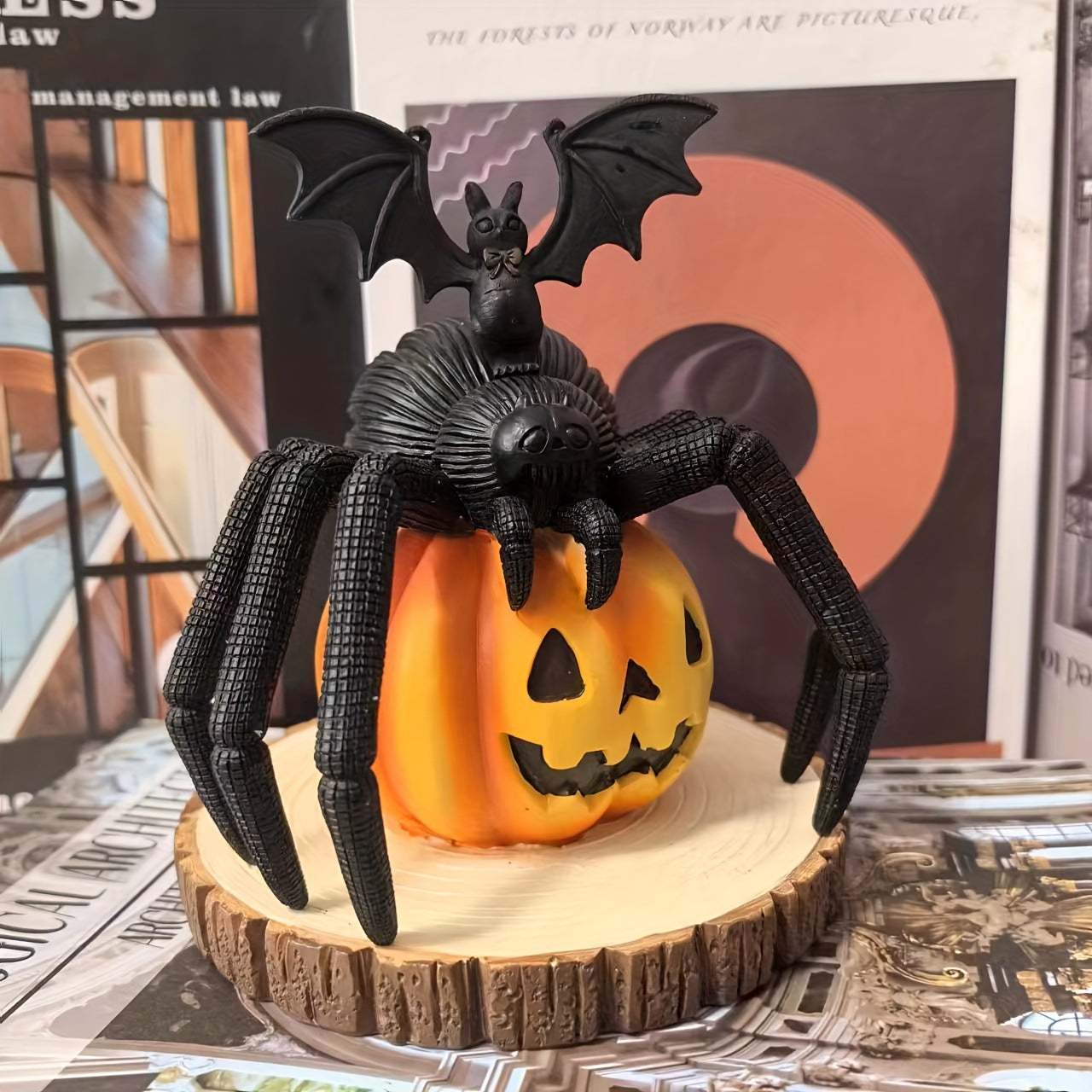 Bring a daring touch to your Halloween décor with this striking resin decoration featuring a menacing spider poised on a vibrant pumpkin.