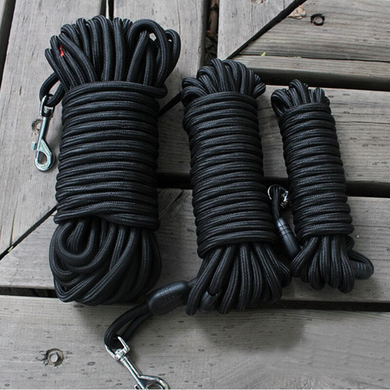 Outfit your pup in style with this long black nylon dog training leash. Crafted from durable materials, this leash is designed to last. Its adjustable length ensures you have the ideal fit and control for any training needs.