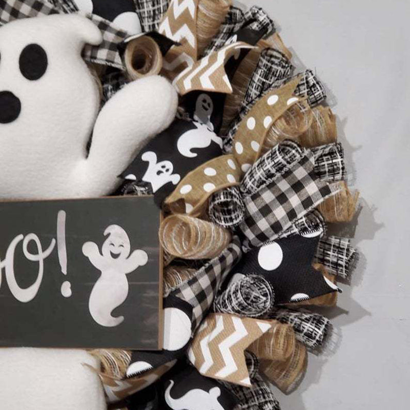 Add a spooky twist to your Halloween decor with this Cute Halloween Ghost Boo Wreath. Featuring playful ghost accents and a bold "Boo" message, it captures the fun and eerie spirit of the season, making your entrance unforgettable.