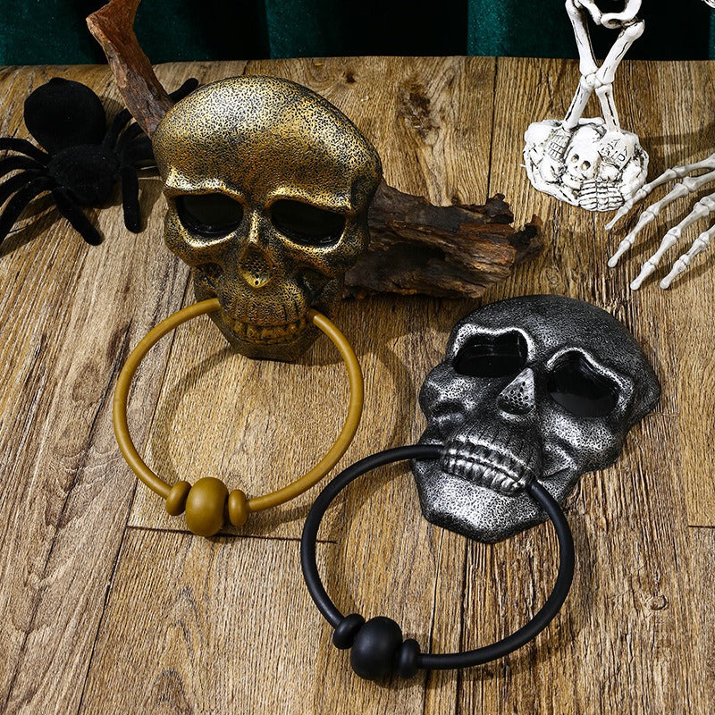 Make a bold statement this Halloween with the Halloween Skull Door Knocker. Crafted to catch attention, this striking decoration adds a spooky touch to your front door while serving as a functional knocker. Its detailed skull design creates an eerie atmosphere that sets the perfect mood for your Halloween festivities.