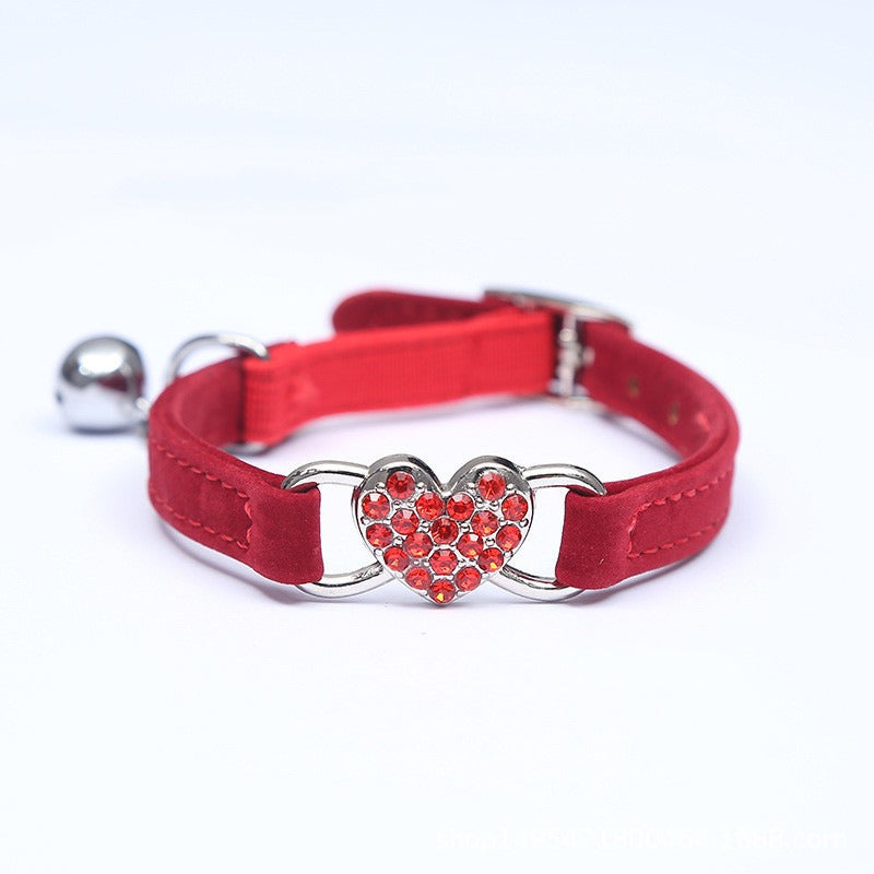 Elevate your furry friend's style with our Medium Crystal Heart Pet Collar with Bell! The sparkling crystal heart adds a touch of elegance while the bell ensures their safety. Give your pet the best of both worlds - fashion and functionality.