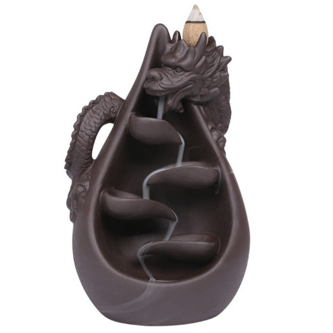 Upgrade your home decor with our Creative Dragon Backflow Incense Burner! Featuring a unique design, it not only adds a touch of elegance to any room but also creates a relaxing and soothing atmosphere with its backflow incense effect. Perfect for those looking for a calming and stylish addition to their space.