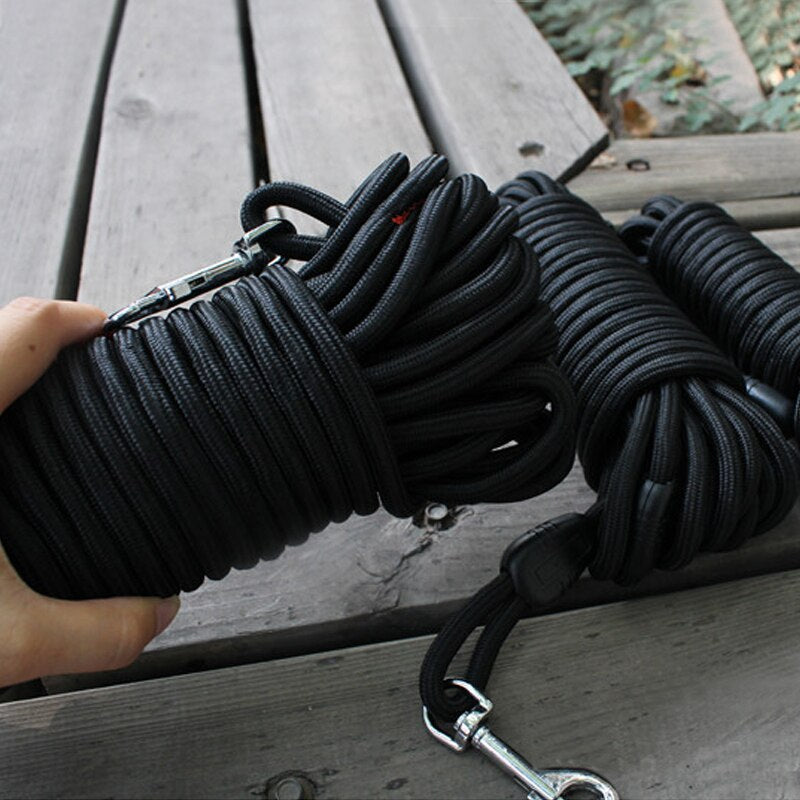 Outfit your pup in style with this long black nylon dog training leash. Crafted from durable materials, this leash is designed to last. Its adjustable length ensures you have the ideal fit and control for any training needs.