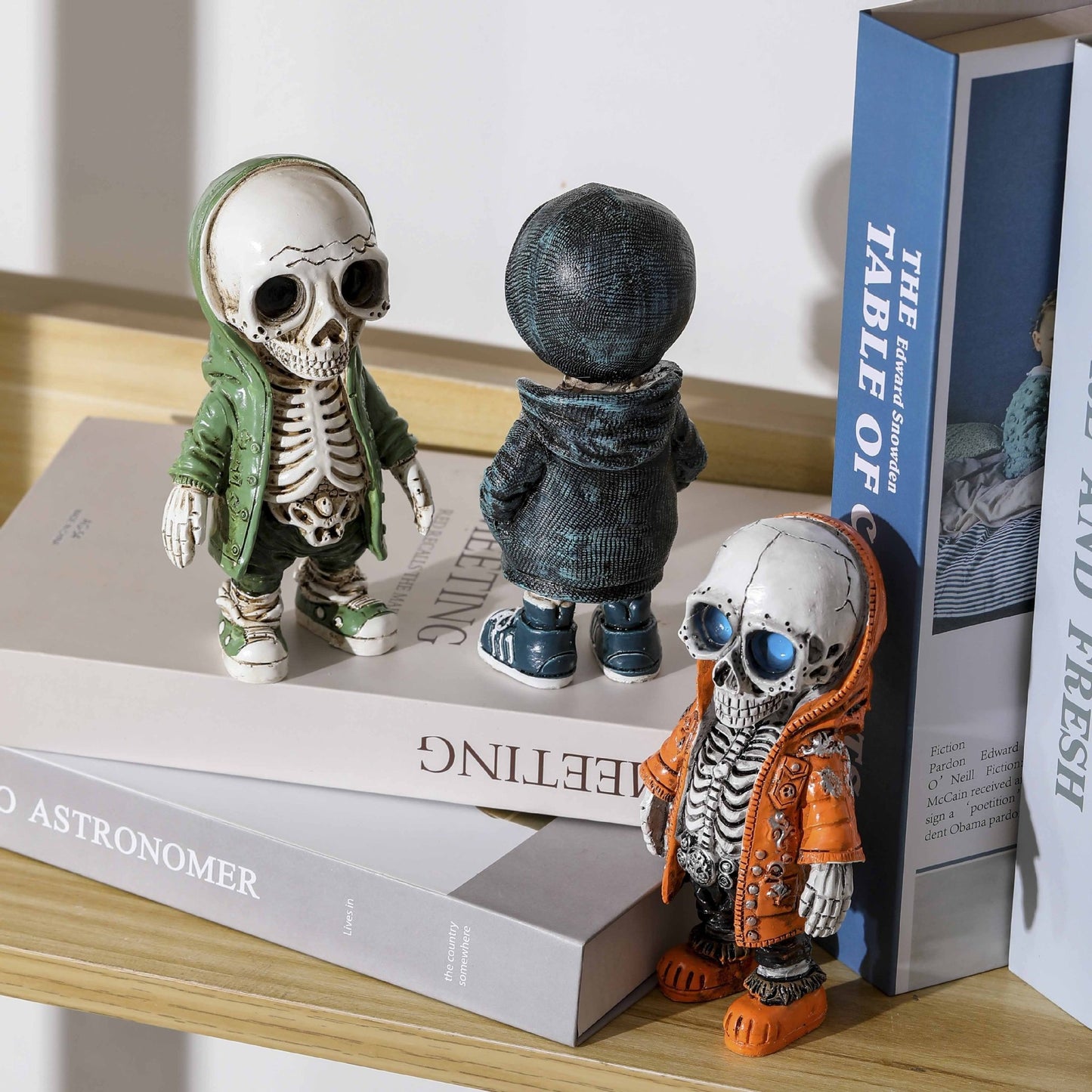 Add a spooky touch to your Halloween decor with this Resin Skeleton Doll Decoration. Crafted from durable resin, it offers a realistic skeletal look that's perfect for creating an eerie atmosphere.