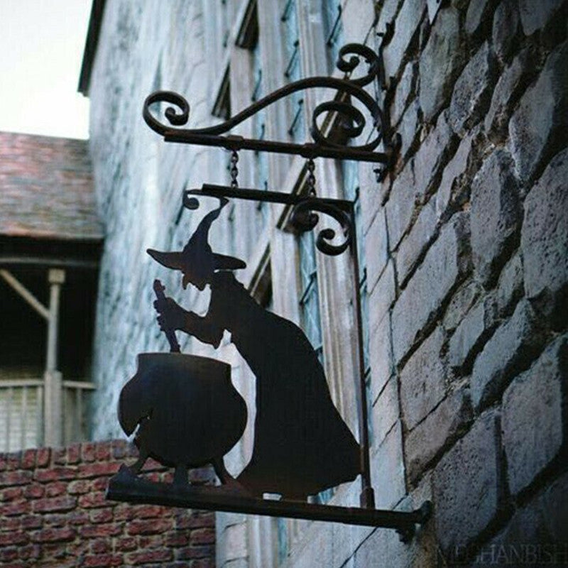 Bring a little magic to your home with this Witch & Cauldron Metal Wall Art. This artistic piece depicts a witch stirring her cauldron, creating something enchanting and sure to bring a unique atmosphere to any area it hangs.
