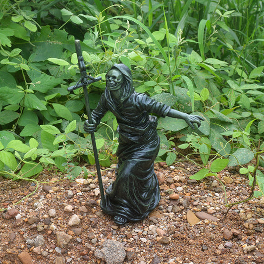 Spook up your garden with this unique hand-painted Grim Reaper sculpture! With its bold and daring design, it will be sure to add an adventurous touch to your Halloween décor.