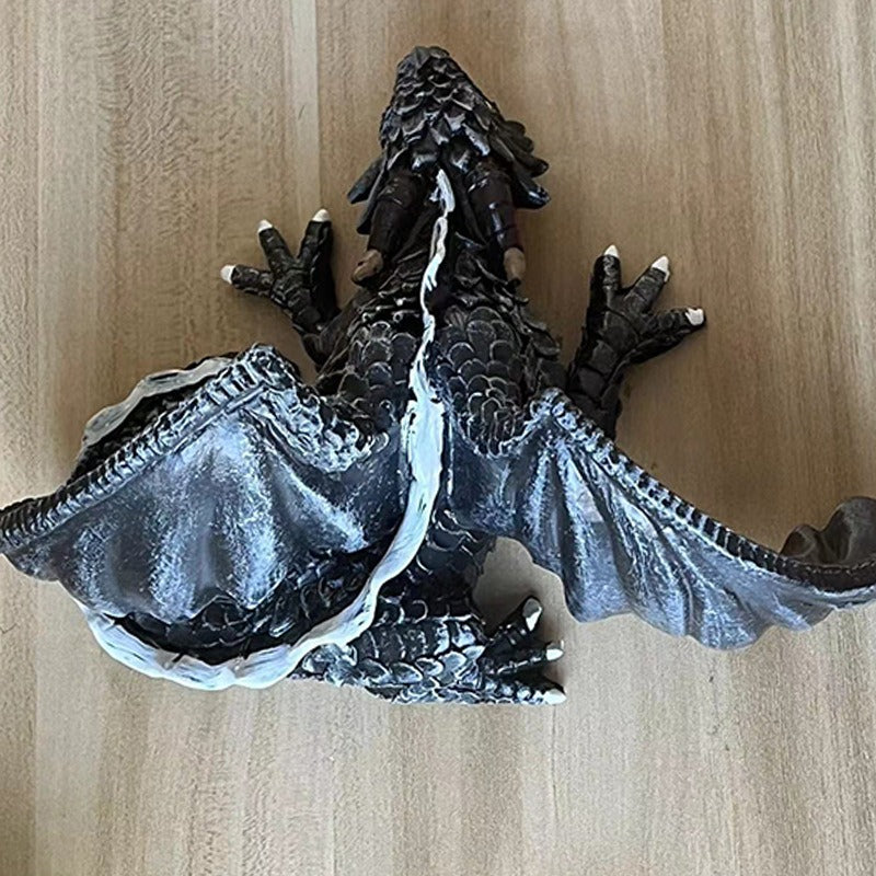Transform your workspace into a realm of fantasy and wonder with our Winged Dragon Desktop Sculpture. Handcrafted with intricate details, this mythical creature adds a touch of magic to your surroundings. Let your imagination take flight with this inspiring and unique piece!