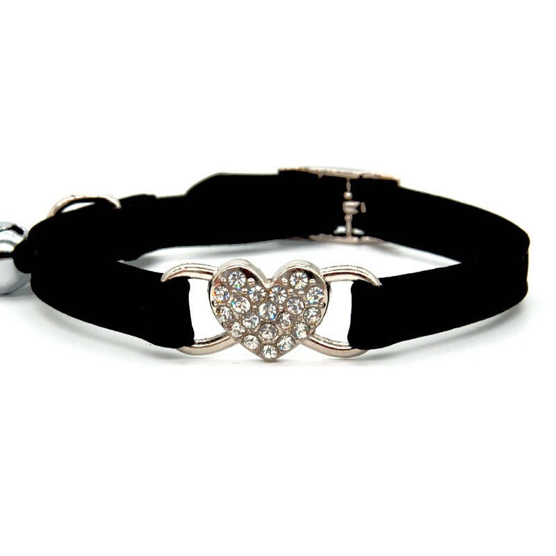 Elevate your furry friend's style with our Medium Crystal Heart Pet Collar with Bell! The sparkling crystal heart adds a touch of elegance while the bell ensures their safety. Give your pet the best of both worlds - fashion and functionality.