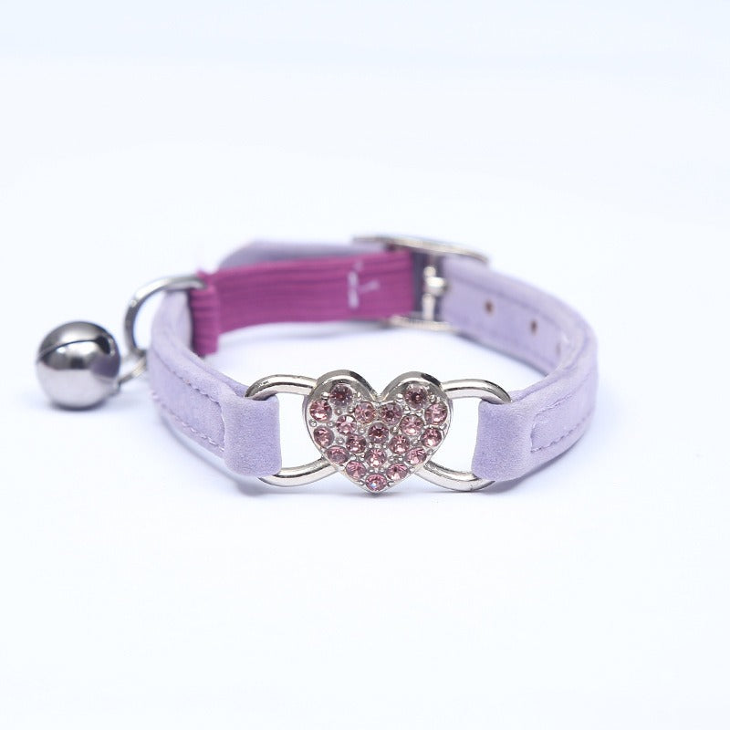 Elevate your furry friend's style with our Medium Crystal Heart Pet Collar with Bell! The sparkling crystal heart adds a touch of elegance while the bell ensures their safety. Give your pet the best of both worlds - fashion and functionality.