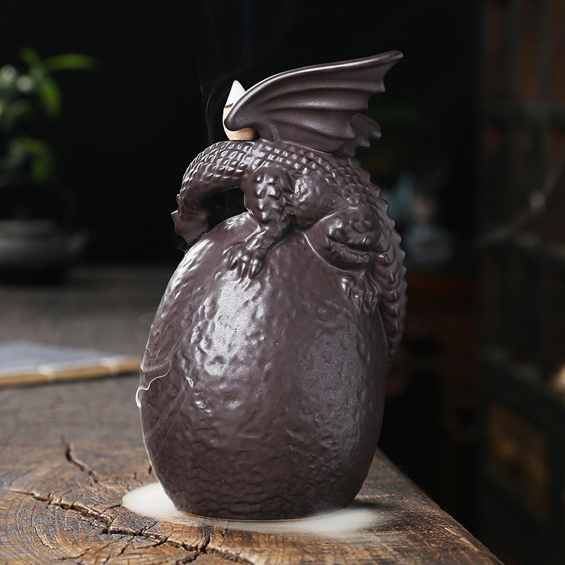 Transform your space into a tranquil oasis with our European Ceramic Dragon Back Flow Incense Burner. The intricately designed dragon allows for a mesmerizing back flow effect, providing a soothing and calming atmosphere. Perfect for relaxation, meditation, or adding a touch of elegance to any room.
