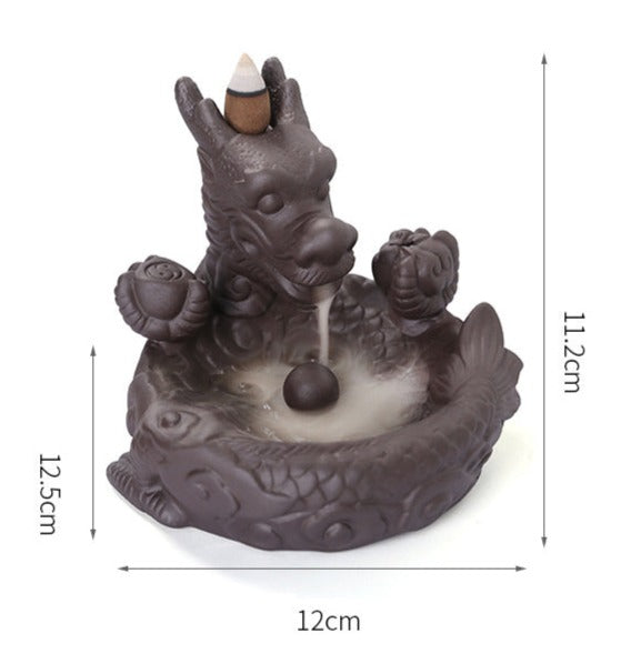 This beautiful Small Dragon Back Flow Incense Burner is a perfect addition to any home. Crafted with intricate details and made from durable material, this incense burner will create an enchanting atmosphere in any room.