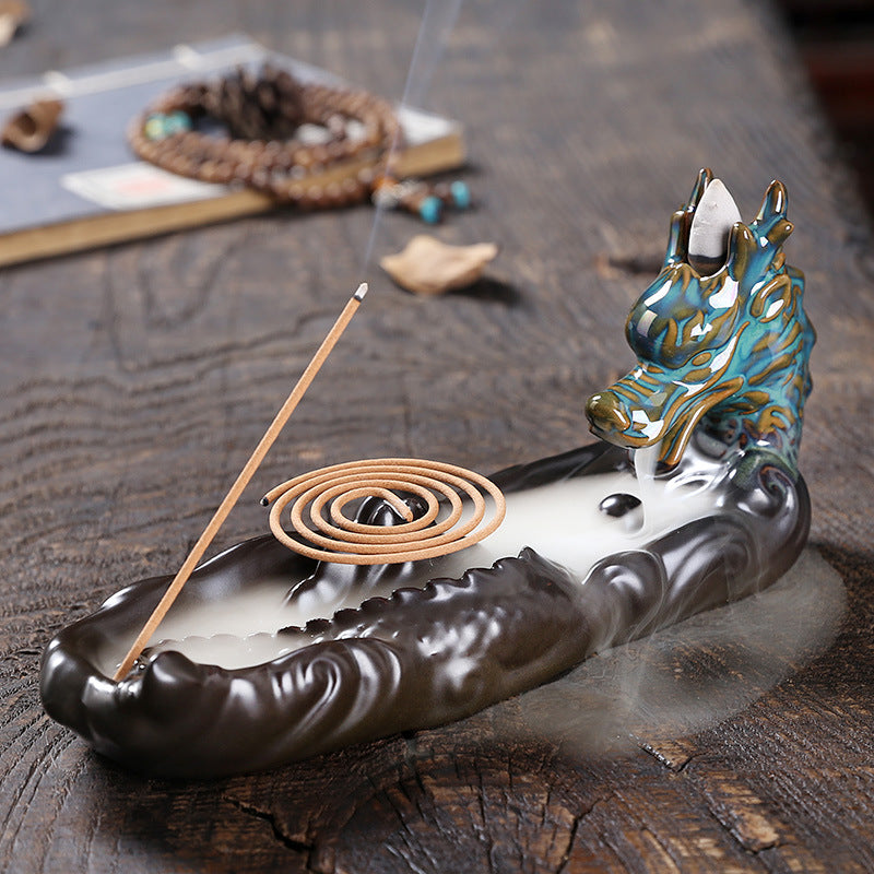 Experience the captivating aroma of burning incense with this stunning Ceramic Backflow Aromatherapy Dragon Incense Burner. Crafted from high-quality ceramic and featuring a majestic dragon design, this incense burner is the perfect way to enhance the atmosphere in any room.