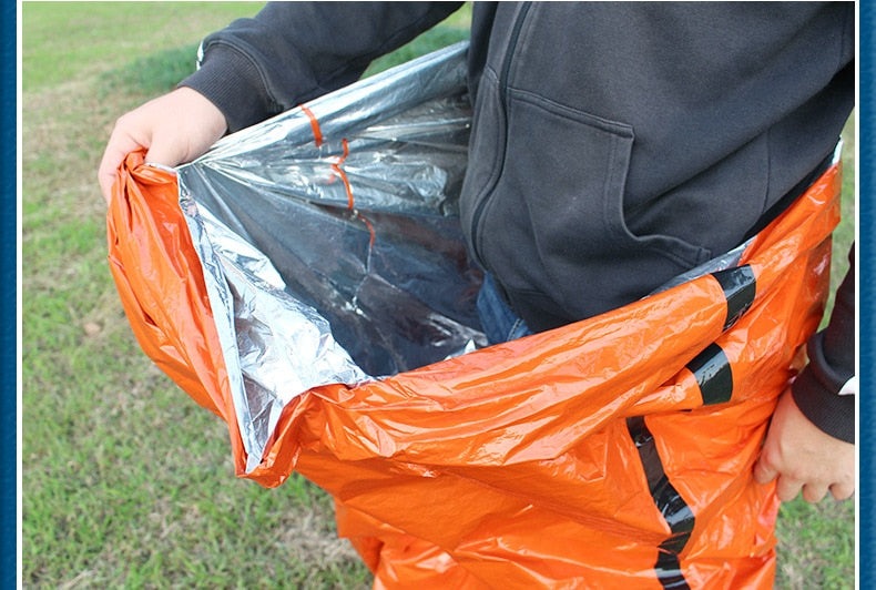 Keep yourself safe and dry in any situation with this emergency reusable waterproof sleeping bag! No matter the weather, you can trust that this bag will provide you with the protection you need, giving you peace of mind. A must-have for any outdoor adventure!