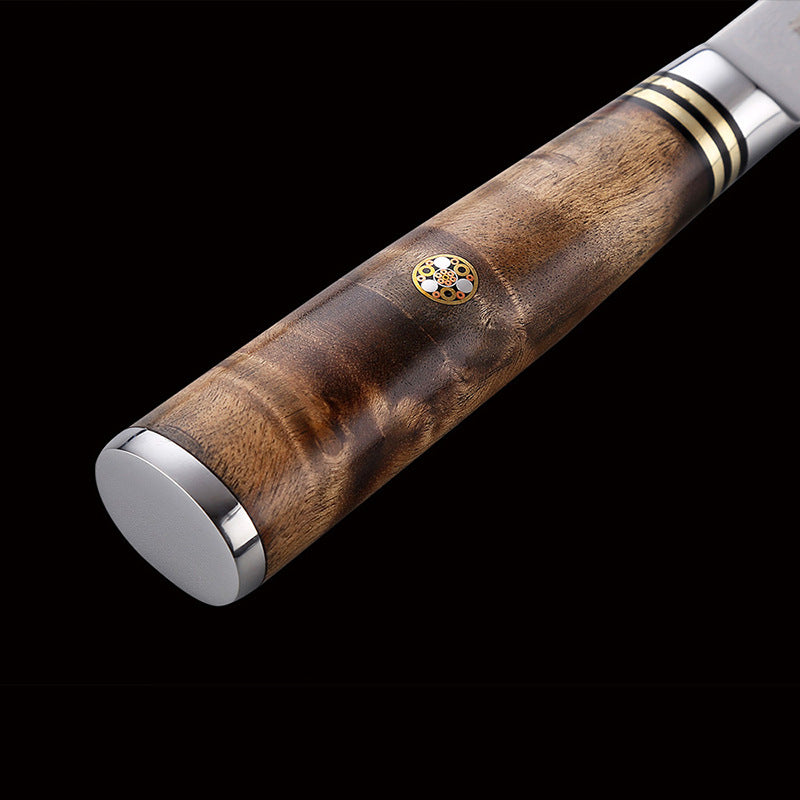 Expertly crafted with exquisite Damascus wood and bone, this 5 inch paring knife is a must-have for any kitchen. The unique pattern of the wood and bone combined with the sharp blade provides optimal slicing and precision.