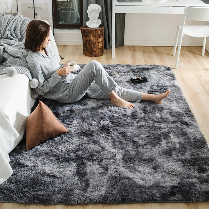 Experience ultimate comfort and luxury with our Plush Soft & Fluffy Anti-Slip Rugs! Sink your feet into the ultra-soft material and enjoy the added safety of the anti-slip backing. Transform any room into a cozy oasis with these premium rugs.