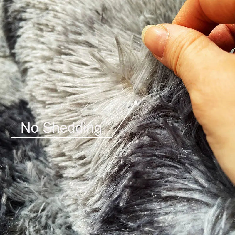 Experience ultimate comfort and luxury with our Plush Soft & Fluffy Anti-Slip Rugs! Sink your feet into the ultra-soft material and enjoy the added safety of the anti-slip backing. Transform any room into a cozy oasis with these premium rugs.