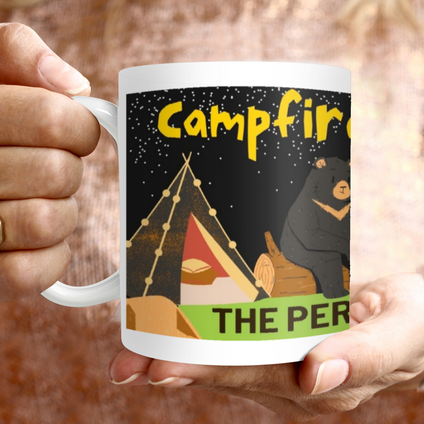 Savor your morning coffee or tea with our Campfire & Friends 11oz Mug! This sturdy ceramic mug features a charming campfire design, perfect for outdoor enthusiasts. Its 11oz size is just right for enjoying your favorite hot beverage.