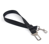 Harness your pup's road-trip adventure with our Adjustable Dog Car Safety Belt. This adjustable belt provides the perfect fit for your pup, keeping them safe, secure, and comfy on the go. So buckle up and enjoy the ride!