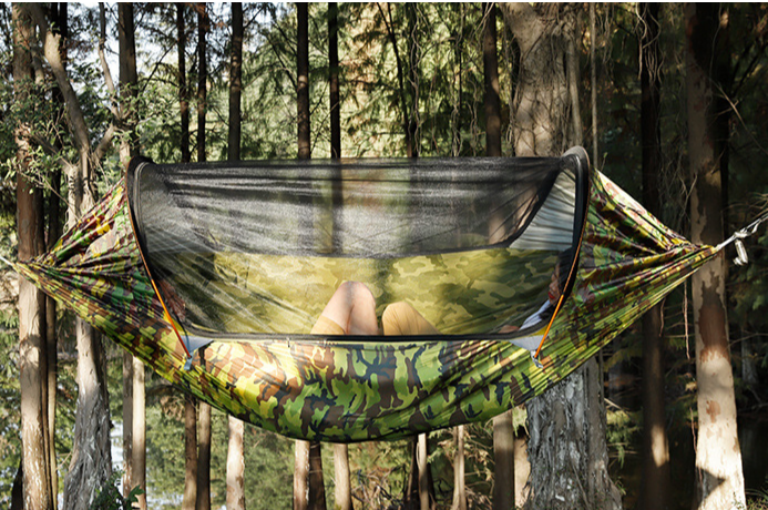 This roomy outdoor swinging hammock is perfect for laying around a lake or at the campground, with the anti-mosquito covering you'll not have to worry about pesky bugs biting you while you relax with a book or take a lazy after noon nap.