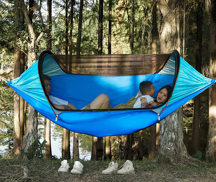 This roomy outdoor swinging hammock is perfect for laying around a lake or at the campground, with the anti-mosquito covering you'll not have to worry about pesky bugs biting you while you relax with a book or take a lazy after noon nap.