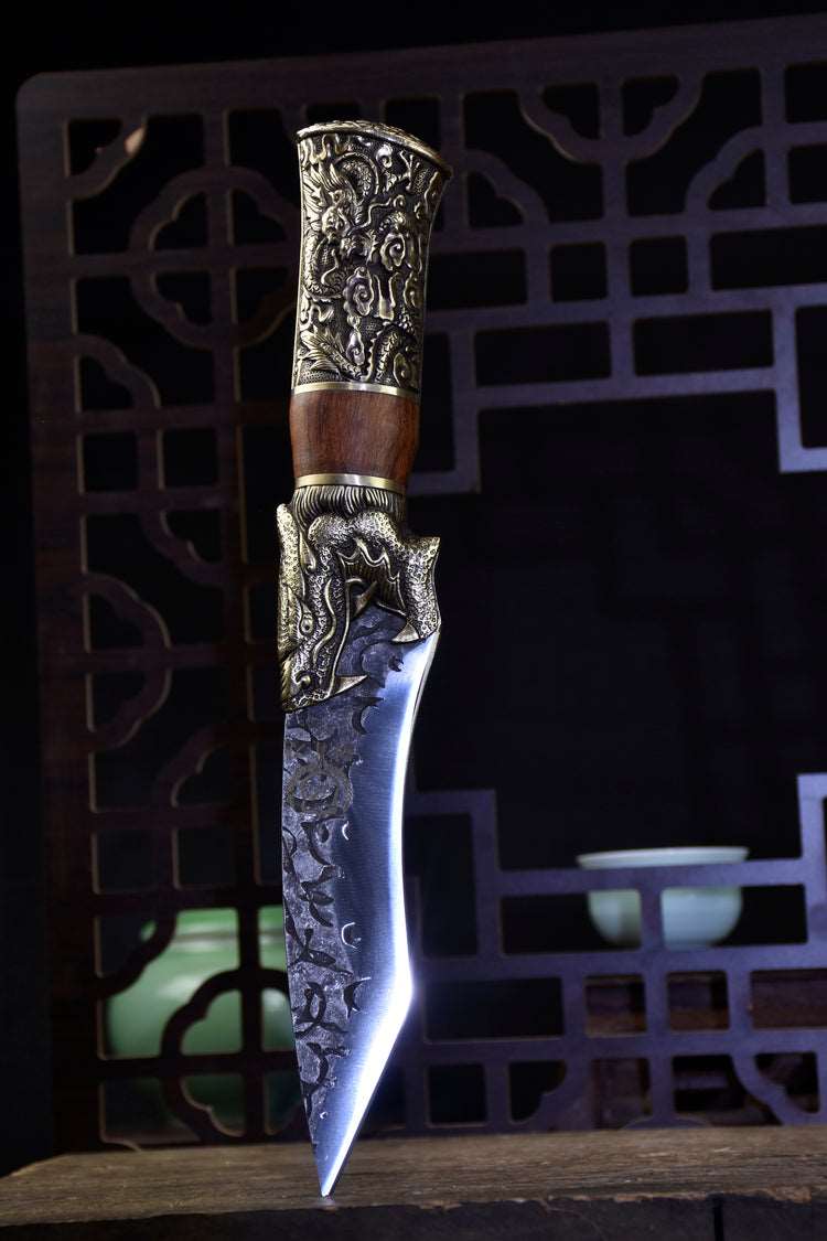 Yulong Single Bone Knife Product Information:  Full length: 28.5cm. Blade length: 14cm. Handle length: 10.5cm. Blade width: 4.0cm at the widest point. Thickness: 0.3cm. Blade material: 7Cr17Mov (7 chromium 17 molybdenum vanadium steel). Handle material: rosewood, fittings: brass.  This knife is being shipped from China, please allow 6 to 8 weeks for delivery. Thank you for your patience.
