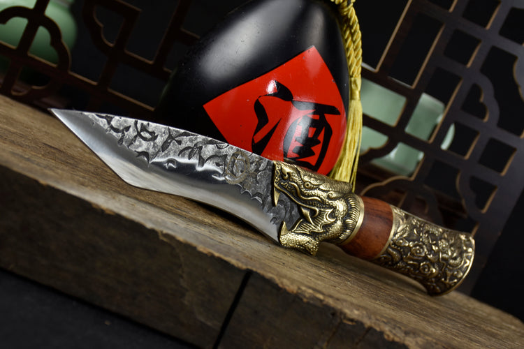 Yulong Single Bone Knife Product Information:  Full length: 28.5cm. Blade length: 14cm. Handle length: 10.5cm. Blade width: 4.0cm at the widest point. Thickness: 0.3cm. Blade material: 7Cr17Mov (7 chromium 17 molybdenum vanadium steel). Handle material: rosewood, fittings: brass.  This knife is being shipped from China, please allow 6 to 8 weeks for delivery. Thank you for your patience.