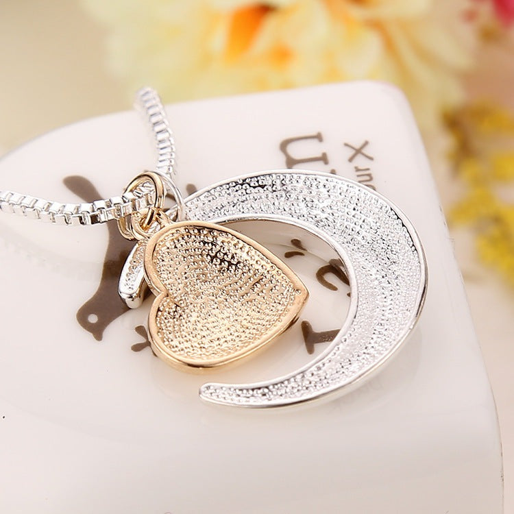 This exquisite sterling silver necklace is a thoughtful gift for the special mother in your life. Crafted with intricate detail, the To The Moon & Back, Heart Mother's Day Necklace is a timeless symbol of your cherished relationship. A perfect way to express your admiration and love.
