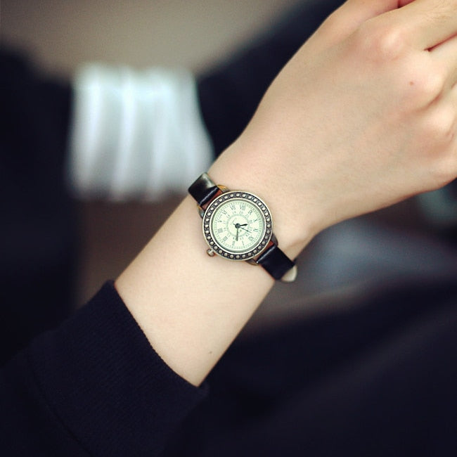 This beautiful vintage style designer watch will bring together your outfit and shows the classy lady that you are. There are several colors to choose from, made with Stainless Steal and has a leather wristband.
