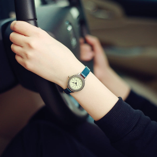 This beautiful vintage style designer watch will bring together your outfit and shows the classy lady that you are. There are several colors to choose from, made with Stainless Steal and has a leather wristband.
