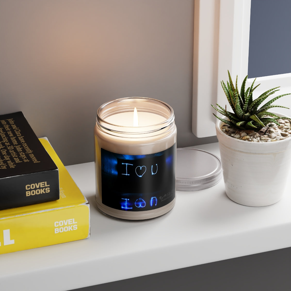 This custom candle jar can accommodate all your ideas, artwork, or inspirational quotes on its custom candle label. The candle itself is made 100% with a natural soy wax blend and cotton wick. Choose between ambrosial fragrances such as Vanilla Bean, Comfort Spice, and Sea Breeze.