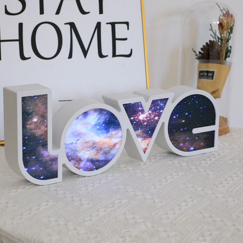 This Decorative LED Love Light Box offers a bright and energy-efficient lighting effect that will illuminate any room. Its light emits a pleasant warm white hue that adds a soft ambiance to your décor. Its plug-and-play design requires no assembly and is powered by a low-voltage power adapter, which makes it safe and hassle-free. This dependable light source will bring an inviting atmosphere to any space.