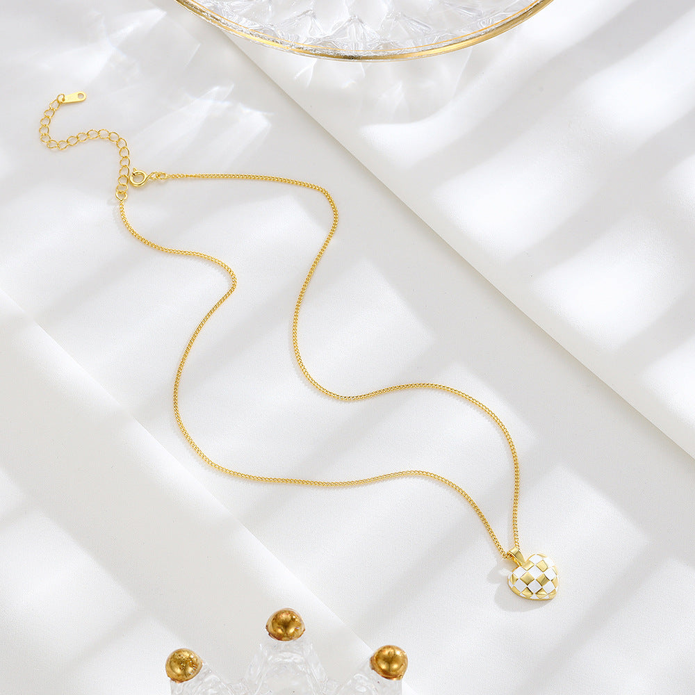 This beautiful S925 Sterling Silver Necklace features a delicate checkerboard heart pendant that adds a subtle luxe touch to any look. Crafted of the highest-quality sterling silver, this piece will maintain its brilliant shine for years to come. Delicately crafted with intricate details, this piece is sure to be cherished for a lifetime.