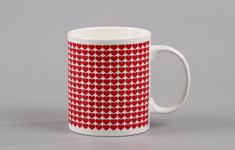 An adorable I Love You Magic Temperature Changing Mug that makes a great gift for the love in your life for Valentine's day, anniversary, birthday or any special occasion. This cool mug changes from cute hearts to I love you when a hot drink is poured into the cup.