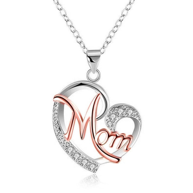 This exquisite Mom Heart Shape Inlaid Crystal Necklace adds an elegant touch of sophistication to any look. Crafted with exact precision and inlaid with shimmering crystals, this sophisticated necklace is a timeless piece of jewelry sure to be cherished for a lifetime.