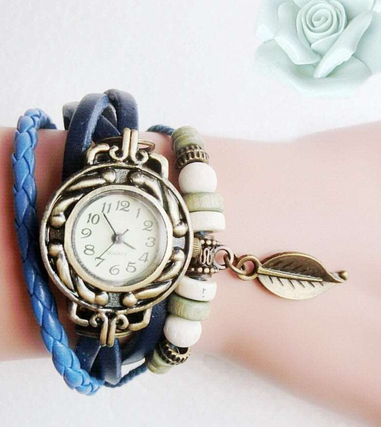 Genuine Leather Vintage Style multicolor High Quality Quartz Watch with a Lovely Bracelet with a snap back.
