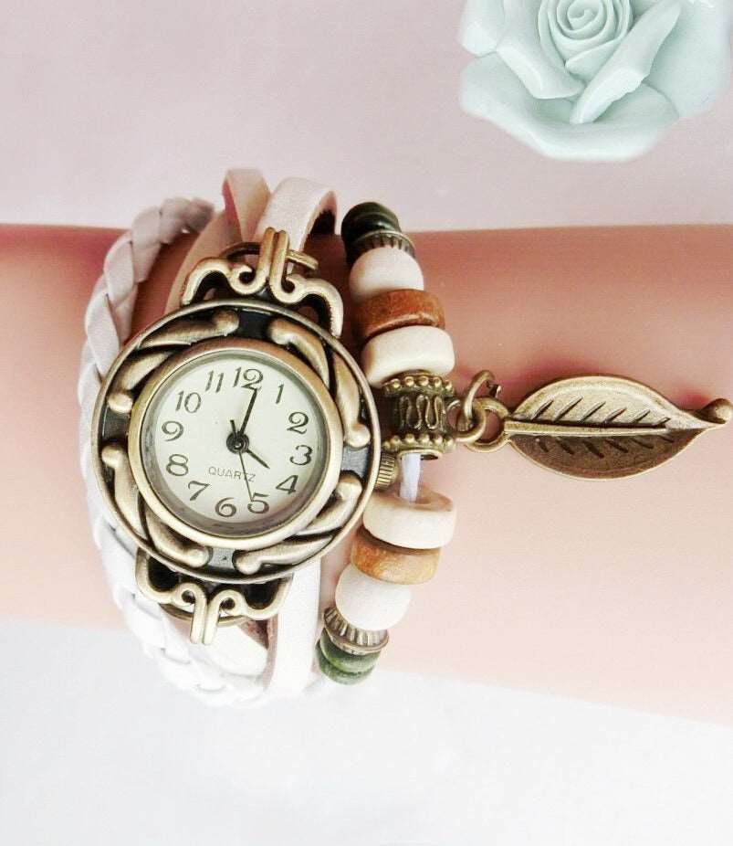 Genuine Leather Vintage Style multicolor High Quality Quartz Watch with a Lovely Bracelet with a snap back.