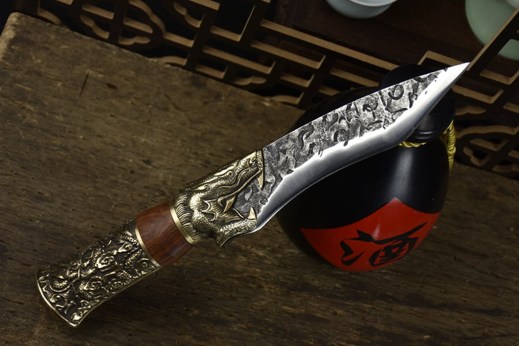 Yulong Single Bone Knife Product Information:  Full length: 28.5cm. Blade length: 14cm. Handle length: 10.5cm. Blade width: 4.0cm at the widest point. Thickness: 0.3cm. Blade material: 7Cr17Mov (7 chromium 17 molybdenum vanadium steel). Handle material: rosewood, fittings: brass.  This knife is being shipped from China, please allow 6 to 8 weeks for delivery. Thank you for your patience.