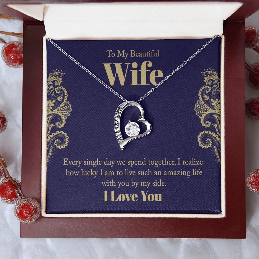 The dazzling Forever Love Necklace is sure to make her heart melt! This necklace features a stunning 6.5mm CZ crystal surrounded by a polished heart pendant embellished with smaller crystals to add extra sparkle and shine. Beautifully crafted with either a white gold or yellow gold finish, be sure to give her a classic gift she can enjoy everyday.