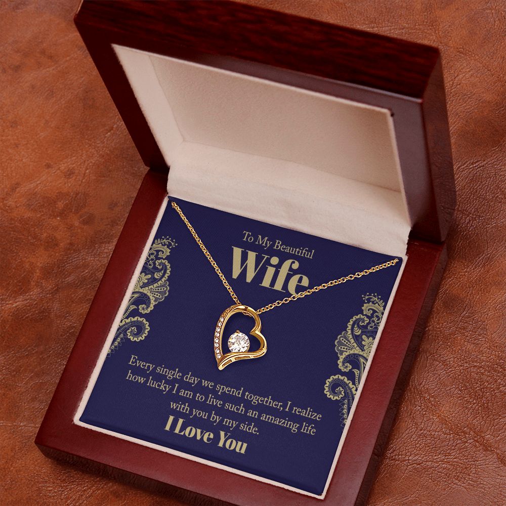 The dazzling Forever Love Necklace is sure to make her heart melt! This necklace features a stunning 6.5mm CZ crystal surrounded by a polished heart pendant embellished with smaller crystals to add extra sparkle and shine. Beautifully crafted with either a white gold or yellow gold finish, be sure to give her a classic gift she can enjoy everyday.