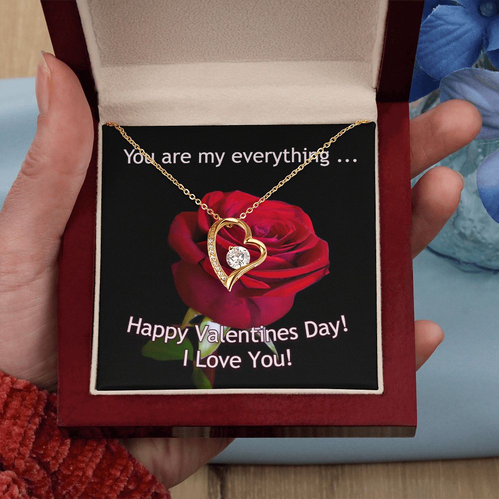 The dazzling Forever Love Necklace is sure to make her heart melt! This necklace features a stunning 6.5mm CZ crystal surrounded by a polished heart pendant embellished with smaller crystals to add extra sparkle and shine. Beautifully crafted with either a white gold or yellow gold finish, be sure to give her a classic gift she can enjoy everyday.