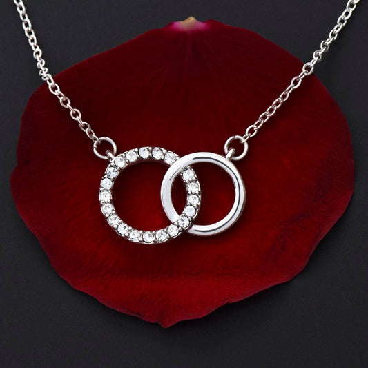 Some things are just better together. The Perfect Pair Necklace is a beautiful representation of togetherness and would make a memorable gift for someone special in your life. This elegant piece is dipped in white gold and features 20 dazzling cubic zirconia crystals. With its brilliant shine and timeless style, this necklace makes the ideal present for any occasion.