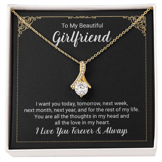 Imagine her reaction when she opens this stunning gift! The Alluring Beauty necklace features a petite ribbon shaped pendant that is sure to dazzle your special someone. Whether it's a birthday or anniversary, make sure to get her a gift she will love for years to come.