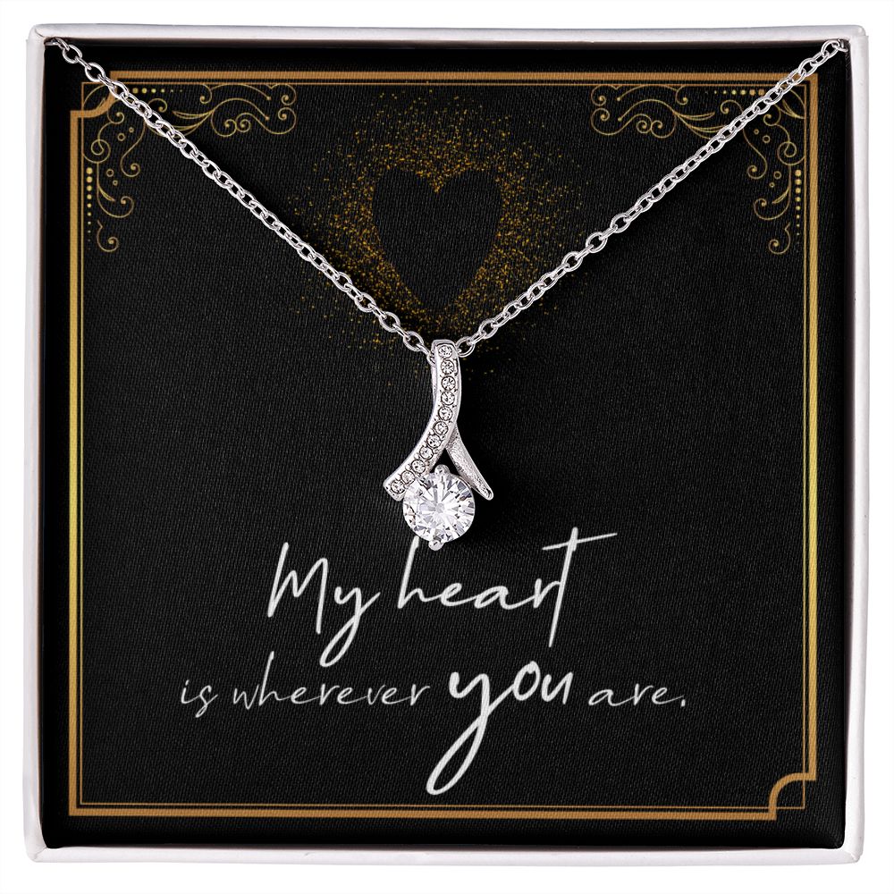 Imagine her reaction when she opens this stunning gift! The Alluring Beauty necklace features a petite ribbon shaped pendant that is sure to dazzle your special someone. Whether it's a birthday or anniversary, make sure to get her a gift she will love for years to come.