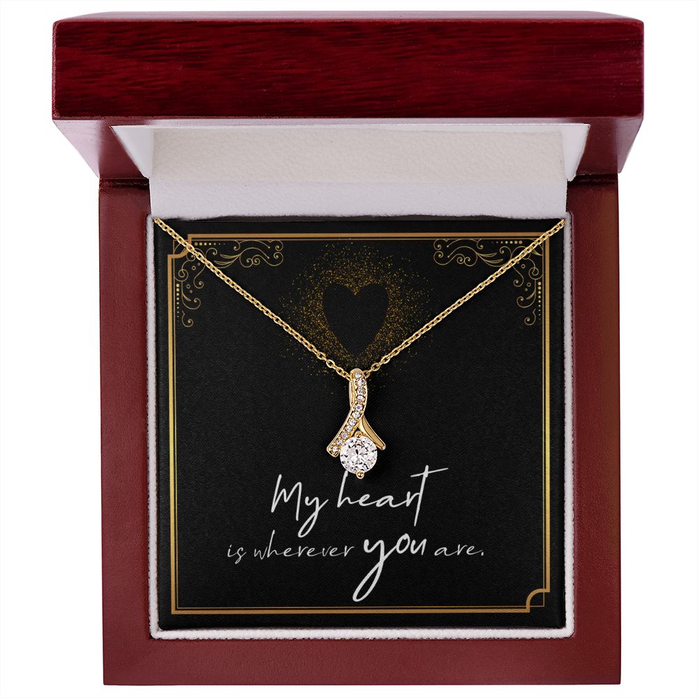 Imagine her reaction when she opens this stunning gift! The Alluring Beauty necklace features a petite ribbon shaped pendant that is sure to dazzle your special someone. Whether it's a birthday or anniversary, make sure to get her a gift she will love for years to come.