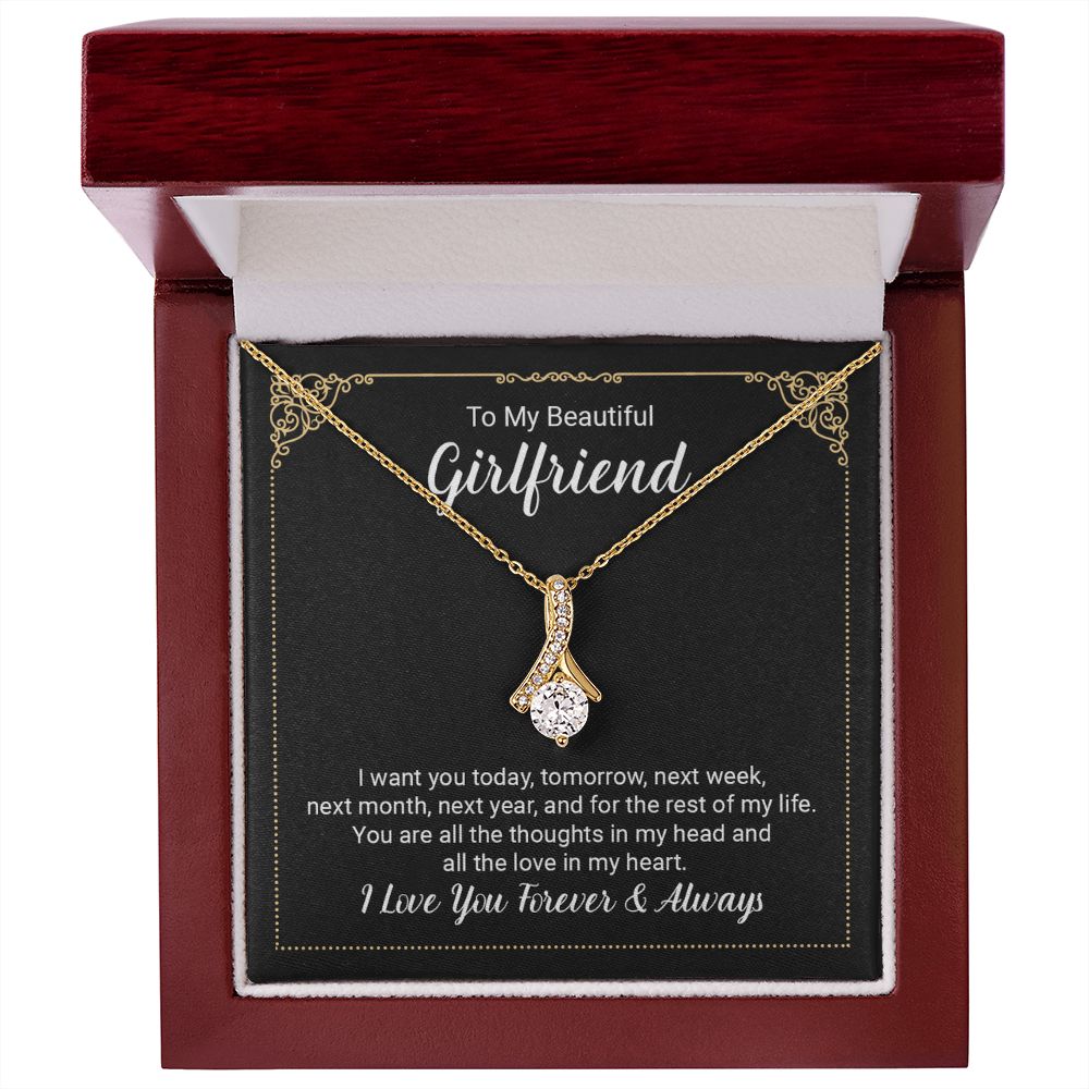 Imagine her reaction when she opens this stunning gift! The Alluring Beauty necklace features a petite ribbon shaped pendant that is sure to dazzle your special someone. Whether it's a birthday or anniversary, make sure to get her a gift she will love for years to come.