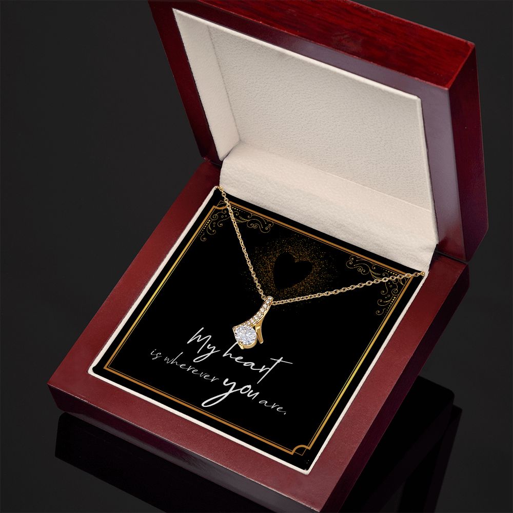 Imagine her reaction when she opens this stunning gift! The Alluring Beauty necklace features a petite ribbon shaped pendant that is sure to dazzle your special someone. Whether it's a birthday or anniversary, make sure to get her a gift she will love for years to come.