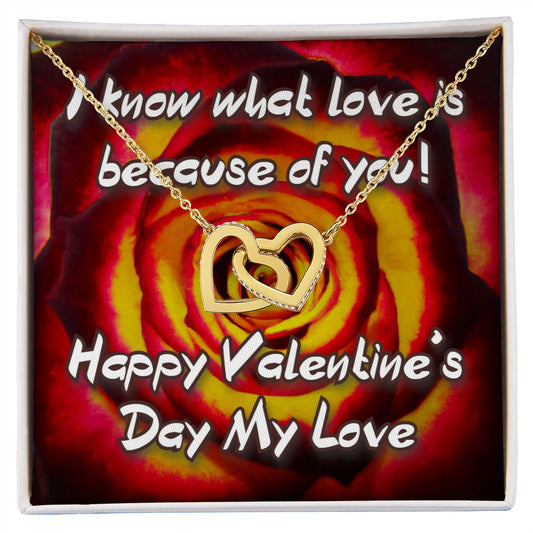 Give her the gift that symbolizes your never-ending love. Featuring two lovely hearts embellished with cubic zirconia crystals, this Valentine's Day Interlocking Hearts necklace is the perfect accessory for everyday wear.