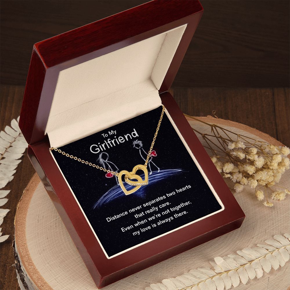 Give your girlfriend the gift that symbolizes your never-ending love. Featuring two lovely hearts embellished with cubic zirconia crystals, this Interlocking Hearts necklace is the perfect accessory for everyday wear. Whether it's a memorable anniversary or a special birthday, make sure to dazzle your special someone by gifting them this stunning necklace.