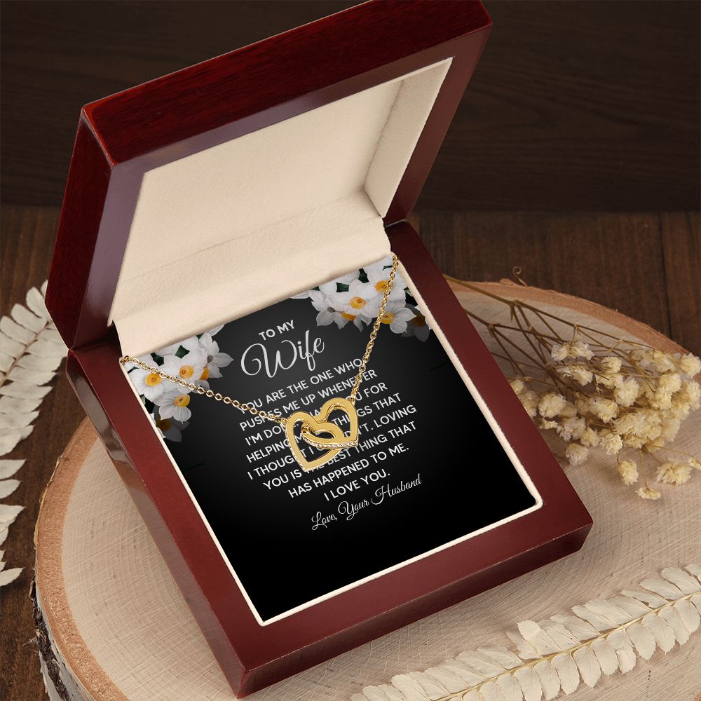 Give her the gift that symbolizes your never-ending love. Featuring two lovely hearts embellished with cubic zirconia crystals, this Interlocking Hearts necklace is the perfect accessory for everyday wear. Whether it's a memorable anniversary or a special birthday, make sure to dazzle your special someone by gifting them this stunning necklace.