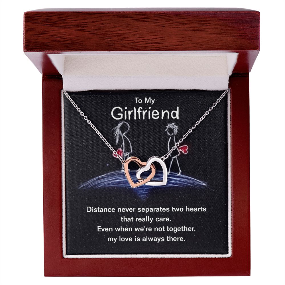 Give your girlfriend the gift that symbolizes your never-ending love. Featuring two lovely hearts embellished with cubic zirconia crystals, this Interlocking Hearts necklace is the perfect accessory for everyday wear. Whether it's a memorable anniversary or a special birthday, make sure to dazzle your special someone by gifting them this stunning necklace.